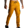 JOGGER MOSTAZA BROCHE MOMENTUM